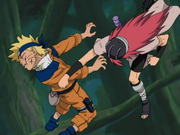 Tayuya punches Naruto.