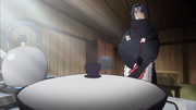 Itachi preparando el huevo frito
