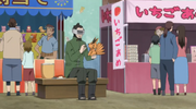 Shino playing with his Kurama doll.
