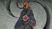 Obito używa krótkodystansowego Kamui