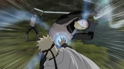 Naruto attacks a Kiri hunter-nin with Rasengan.