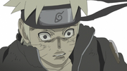 Naruto aturdido por la extracción de Kurama