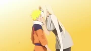 Tsunade le desea suerte a  con un beso.
