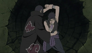 Itachi teniendo a Sasuke atrapado en su ilusión