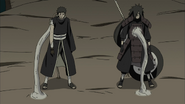 Madara e Obito se conectam com o Dez-Caudas.