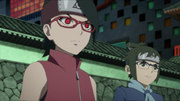 Sarada utilizando seu Sharingan para detectar a informação de Denki