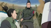 Shikaku ao lado de seu filho e Shiho após Konoha ser destruída.
