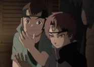 Sasori haciendo marionetas mientras está con su amigo