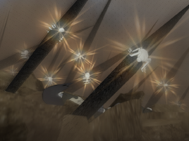 …forcing it against the ground, where the spiders detonate.