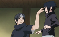 Itachi pokes Sasuke