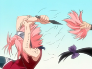 Sakura se tranche les cheveux