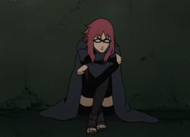 Karin suppressing her chakra.