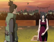 Shikamaru y Kurenai en la tumba de Asuma