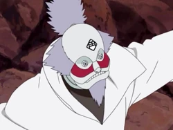 Марионетка 7: У этой марионетки имеется конский хвост, борода, красные маркировки под глазами, а также кандзи, обозначающее "Дхарма" (яп. 法, Хоо) на языке, которое взаимодействует с марионетками Сангхи и Будды при использовании техники Всасывающее Измельчение Трёх Драгоценностей.