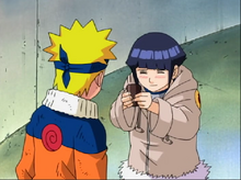 Hinata gives ointment to Naruto.