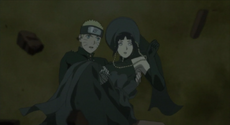 Naruto carries Hinata in a bridal's way.