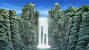 The statues bordering the valley (Madara, left; Hashirama, right).