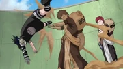 Sasuke fighting Gaara.