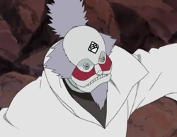 Puppet 7: This puppet had a ponytail, a beard, red markings under its eyes and the kanji for "Dharma" (法, Hō) in its mouth, and worked with the Buddha and Sangha puppets to use the Three Jewels Suction Crushing technique.