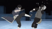 Obito clashing with Kakashi in hand-to-hand combat.