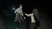 Sasuke is stabbed by Madara.