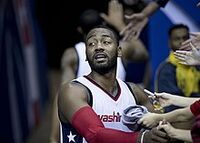 John Wall signs autographs