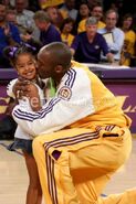 Kobe kissing Natalia