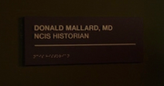 The plaque on the door to Ducky's new office in his new position as NCIS Historian.