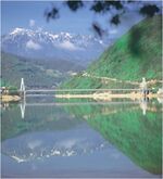 The Neretva distinctive feature, old suspension bridge over the Jablaničko Lake at Ostrožac village