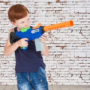A model firing the blue Eradicator.
