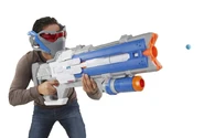 A model holding the blaster and wearing the Soldier: 76 mask.