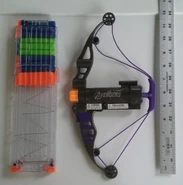 The Hawkeye Longshot Bow compared to an eighteen dart clip.