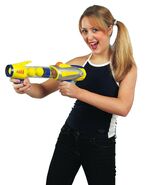 A model holding the yellow, gray, Cosmic Thruster.