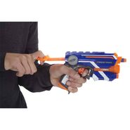 A Nerf model priming the Firestrike.