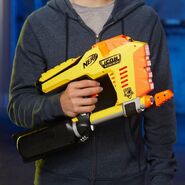 A Nerf model holding the Magstrike.