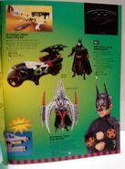 Listings for the Bat-Signal Blaster and Combat Utility Belt in the 1997 Hasbro product catalog.