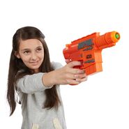 A Nerf model aiming the Captain Cassian Andor Blaster.