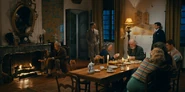 Varian, Thomas and others in the villa dining room