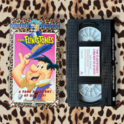 Flintstonespageoutofhistorycover1