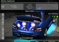 A Subaru with an underside and trunk neon in Need for Speed: Underground 2.