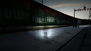 The name of the Amusement Park is written on a wall