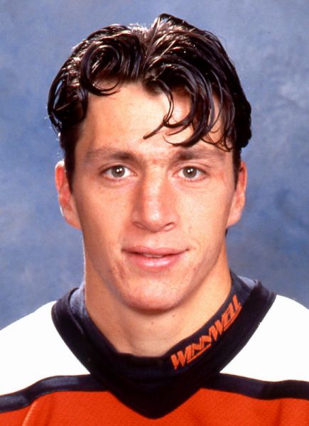 Rod Brind'Amour, a former Philadelphia Flyers player and current Carolina  Hurricanes assistant coach pauses during a ceremony inducting him into the  Flyer's Hall of Fame before an NHL hockey game between the