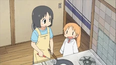 Nano frying an egg with the Professor