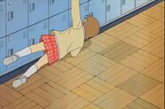 Dramatically, Yuuko hits the lockers.