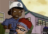 Sam hugging Officer Shirley.