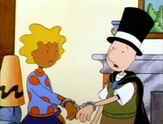 Doug and Patti handcuffed together.