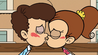 Luan and Benny sharing their first kiss.