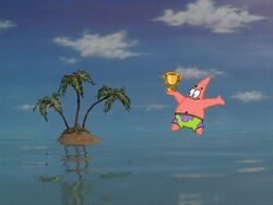Patrick showing his trophy to the island.jpg