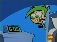 CosmoWatchingTheClock.jpg (36 KB) "Now it's 9:05 on the east coast!"