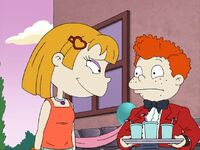 Angelica smiling at Harold.